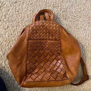 Brown backpack purse. Used once. Soft leather. Adjustable backpack straps.